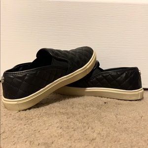 Steve Madden black slide on sneaker